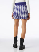 Woman knitted skirt with jewel buttons