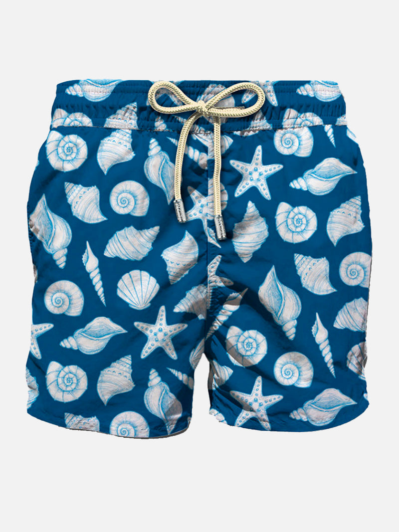 Man light fabric swim shorts with shells print