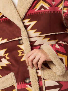 Abrigo reversible de shearling Dorys en beige con motivo étnico 