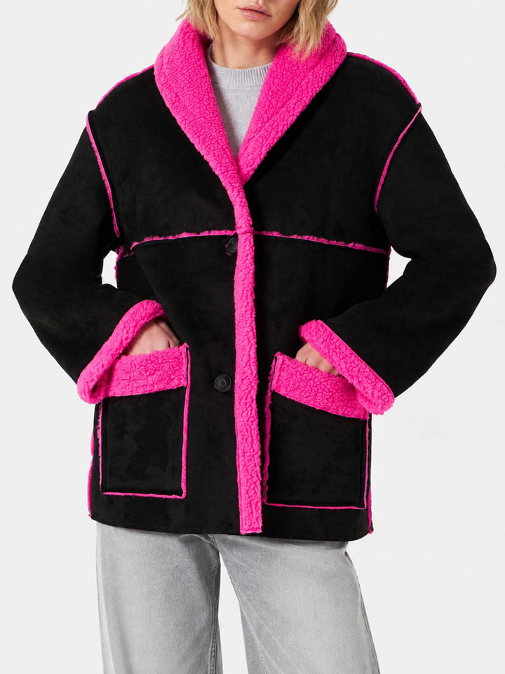 Cappotto Dorys in shearling reversibile nero e fucsia fluo