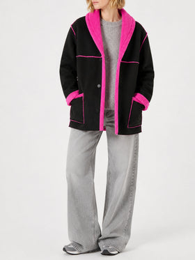 Cappotto Dorys in shearling reversibile nero e fucsia fluo