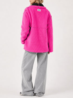 Cappotto Dorys in shearling reversibile nero e fucsia fluo
