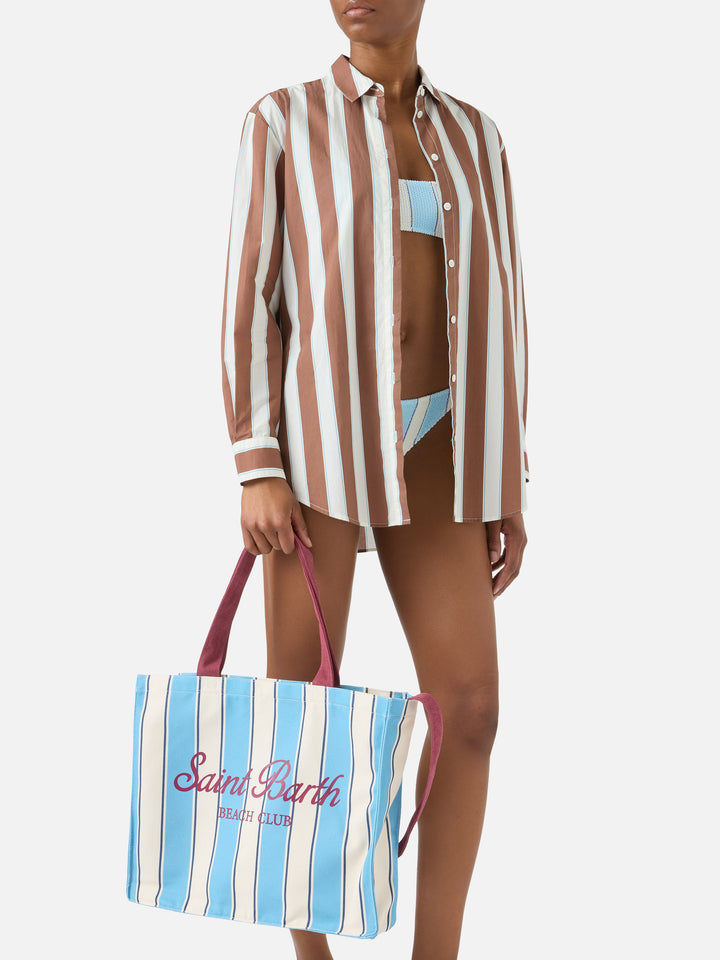Essential canvas tote bag with light blue and white stripes and contrasting logo