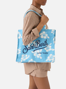 Essential canvas tote bag with light blue hibiscus print and contrasting logo