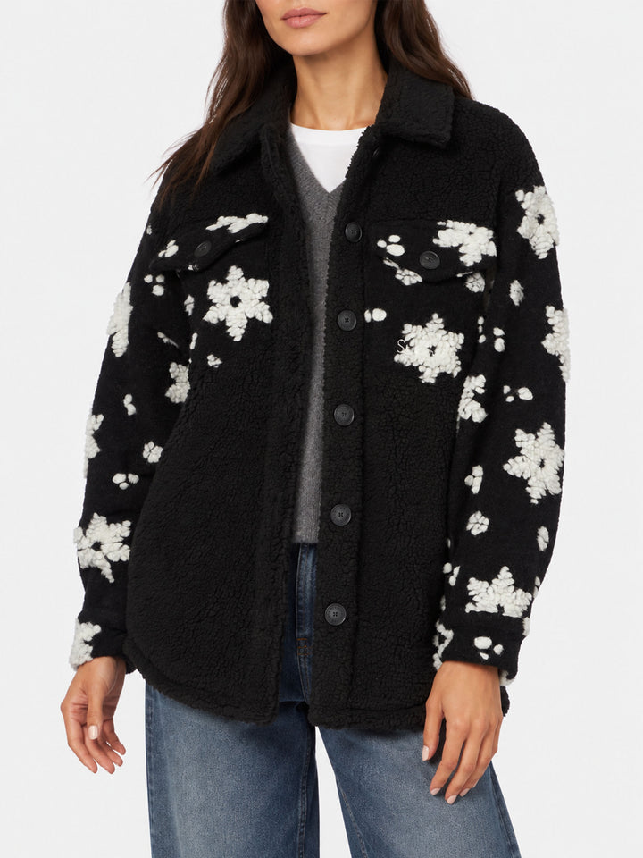 Chaqueta Elys de sherpa negra con motivo de copos de nieve 