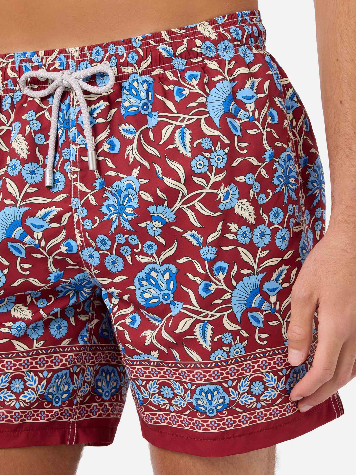 Gustavia bordeauxfarbene Badeshorts mit floralem Print 