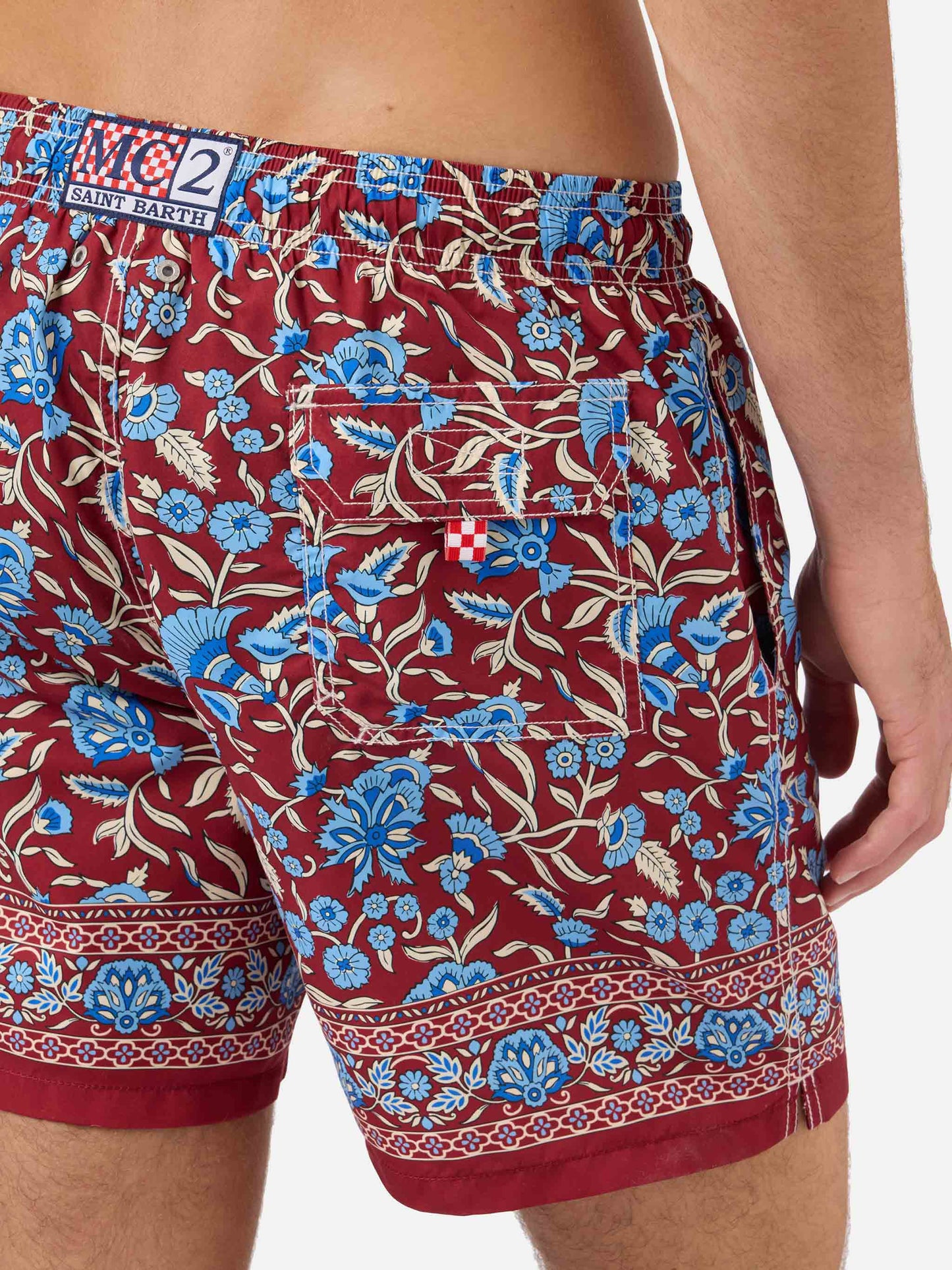 Gustavia bordeauxfarbene Badeshorts mit floralem Print 