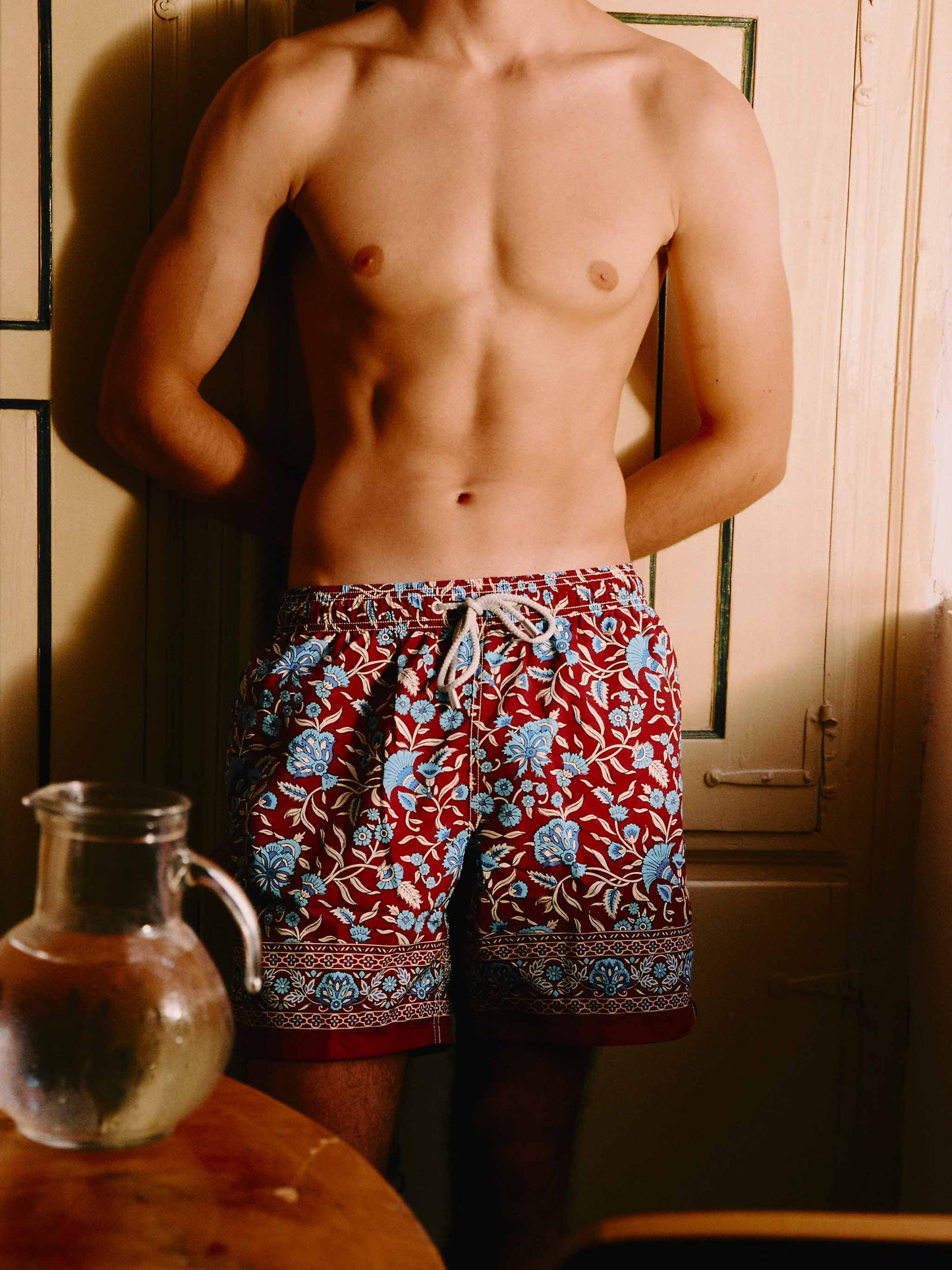 Gustavia burgundy swim shorts with floral print