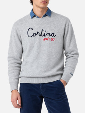 Light grey melange Heron crewneck sweater with Cortina Après Ski embroidery