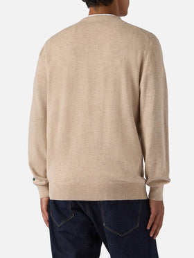 Rundhalspullover „Heron Light“ mit gestickter Uhr „Time has no price“.