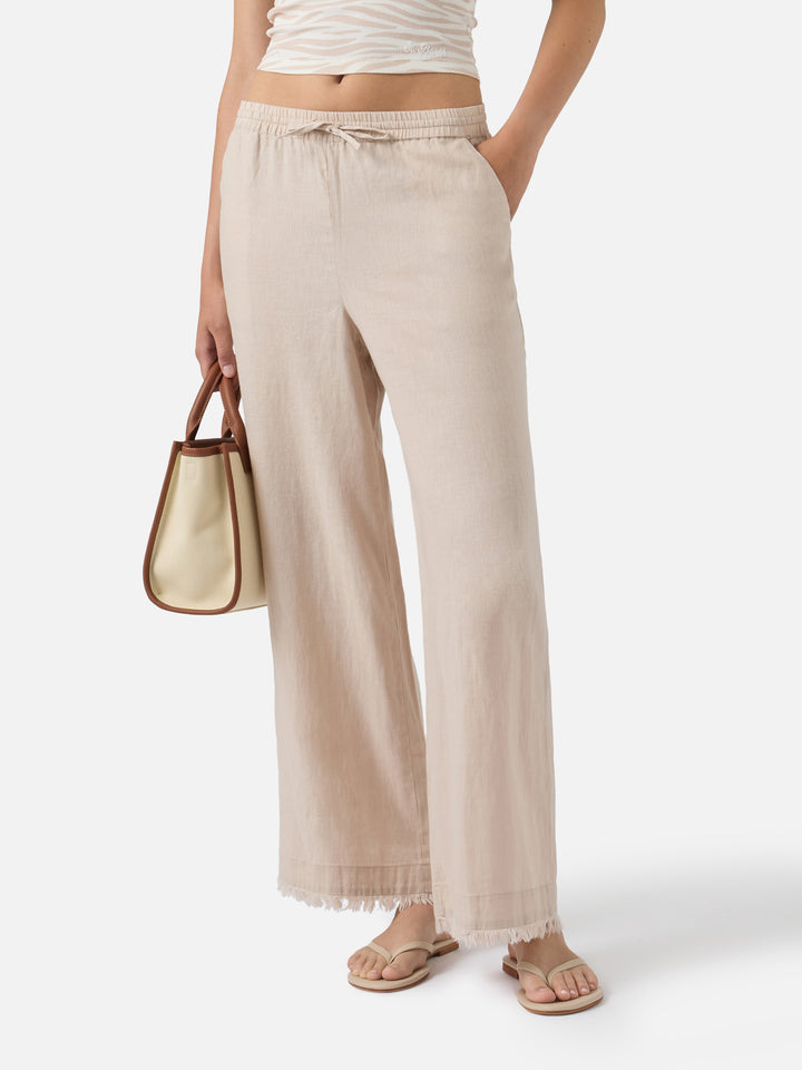 Pantaloni Irma in lino beige con fondo sfrangiato