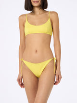 Woman pale yellow bralette bikini Judy Virgo
