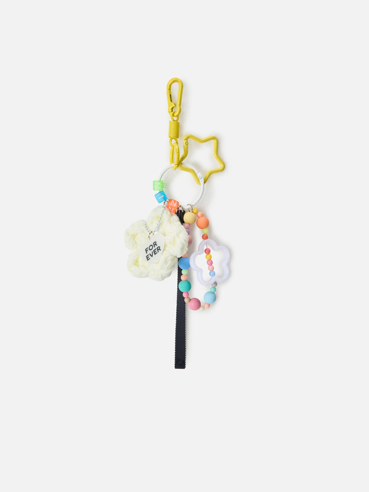 Lustiger Taschenanhänger mit gehäkelter, gepolsterter Gänseblümchen