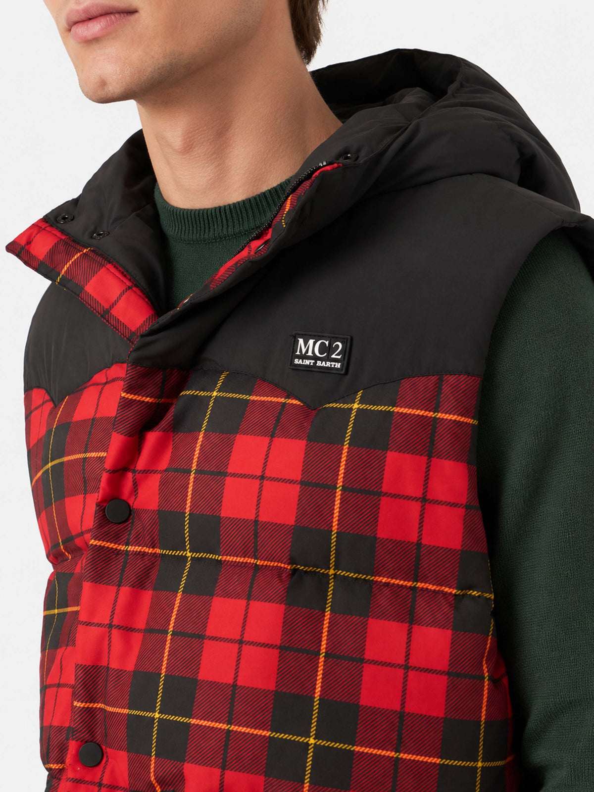 Red and black Klosters hooded vest with tartan pattern
