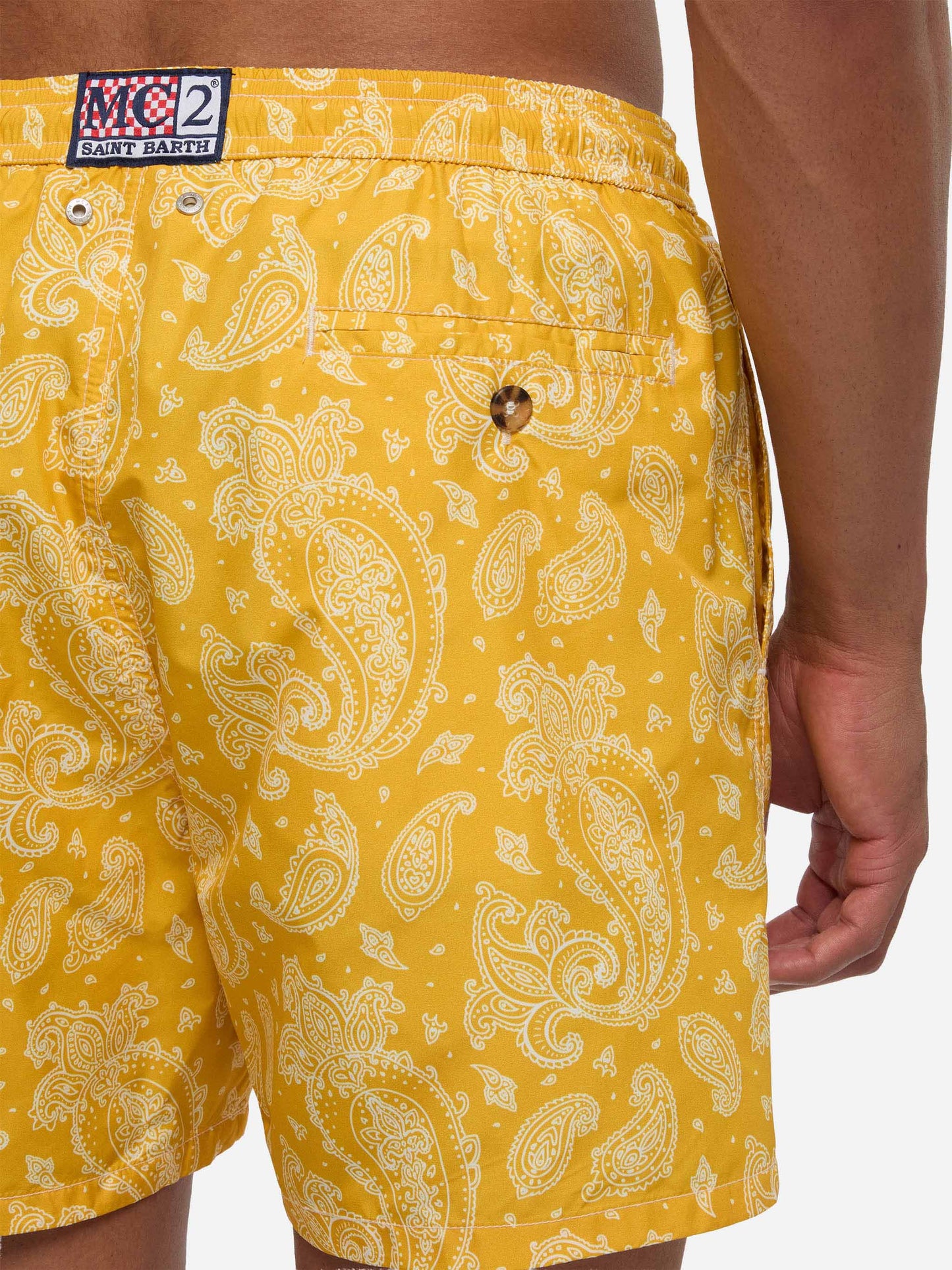 Man light fabric swim shorts with ochre paisley print