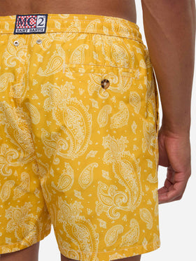 Man light fabric swim shorts with ochre paisley print
