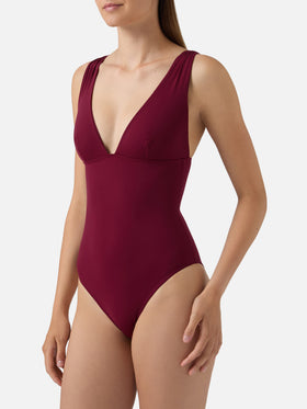 Mavi one-piece swimsuit with deep V neckline in solid bordeaux