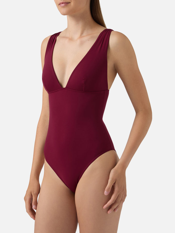 Mavi one-piece swimsuit with deep V neckline in solid bordeaux