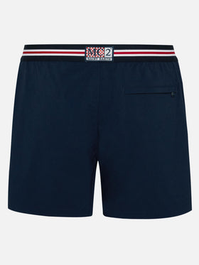 Marineblaue, eng anliegende Badeshorts Nad