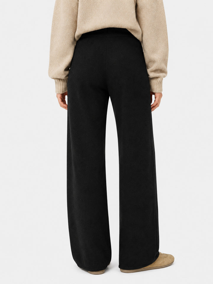 Pantalone a palazzo nero in maglia