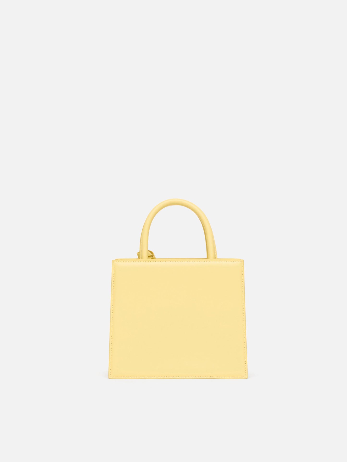 Borsa Shop mini strutturata in pelle liscia giallo tenue con targhetta metallica