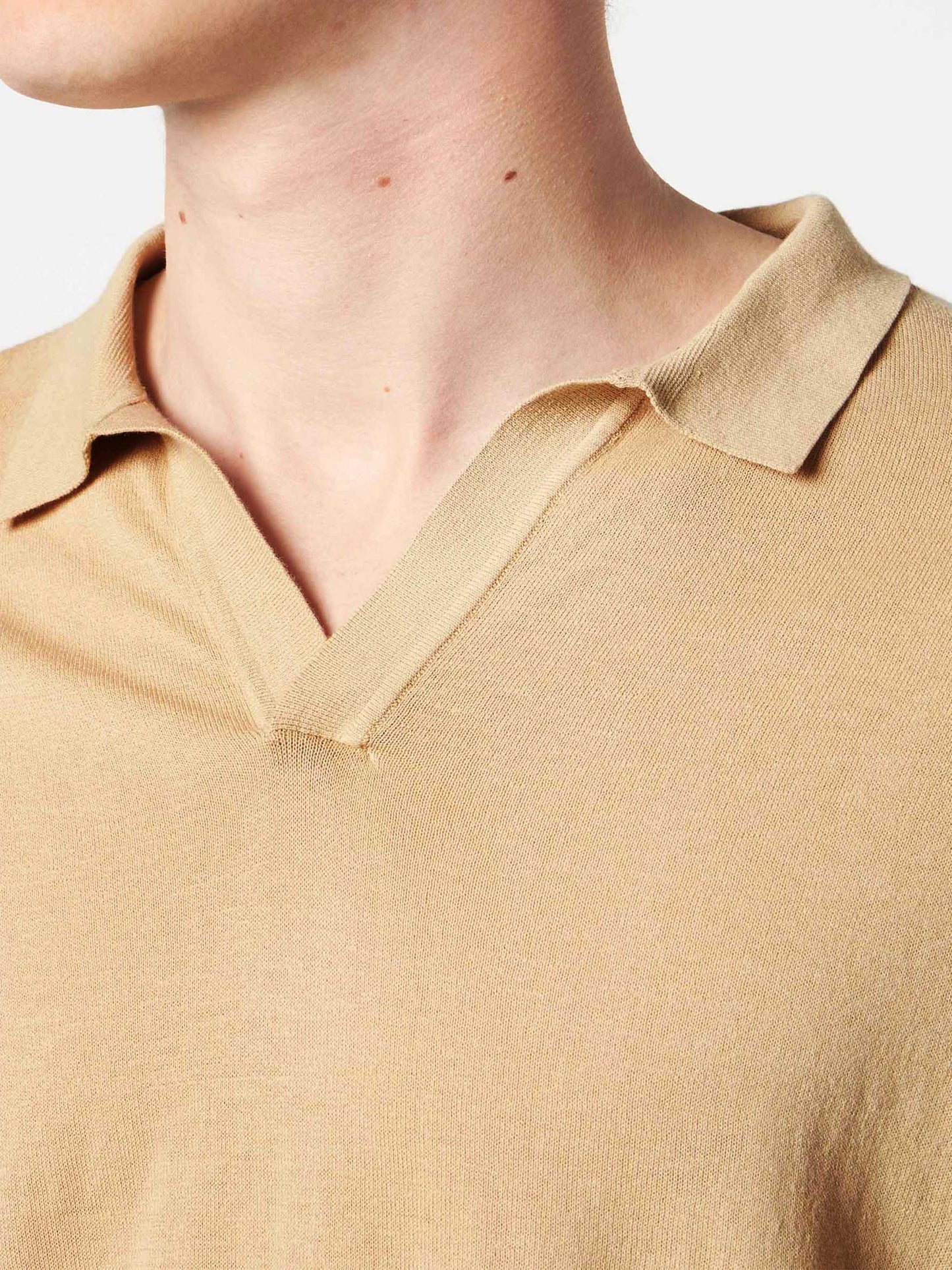 Sloan beige knitted buttonless polo shirt