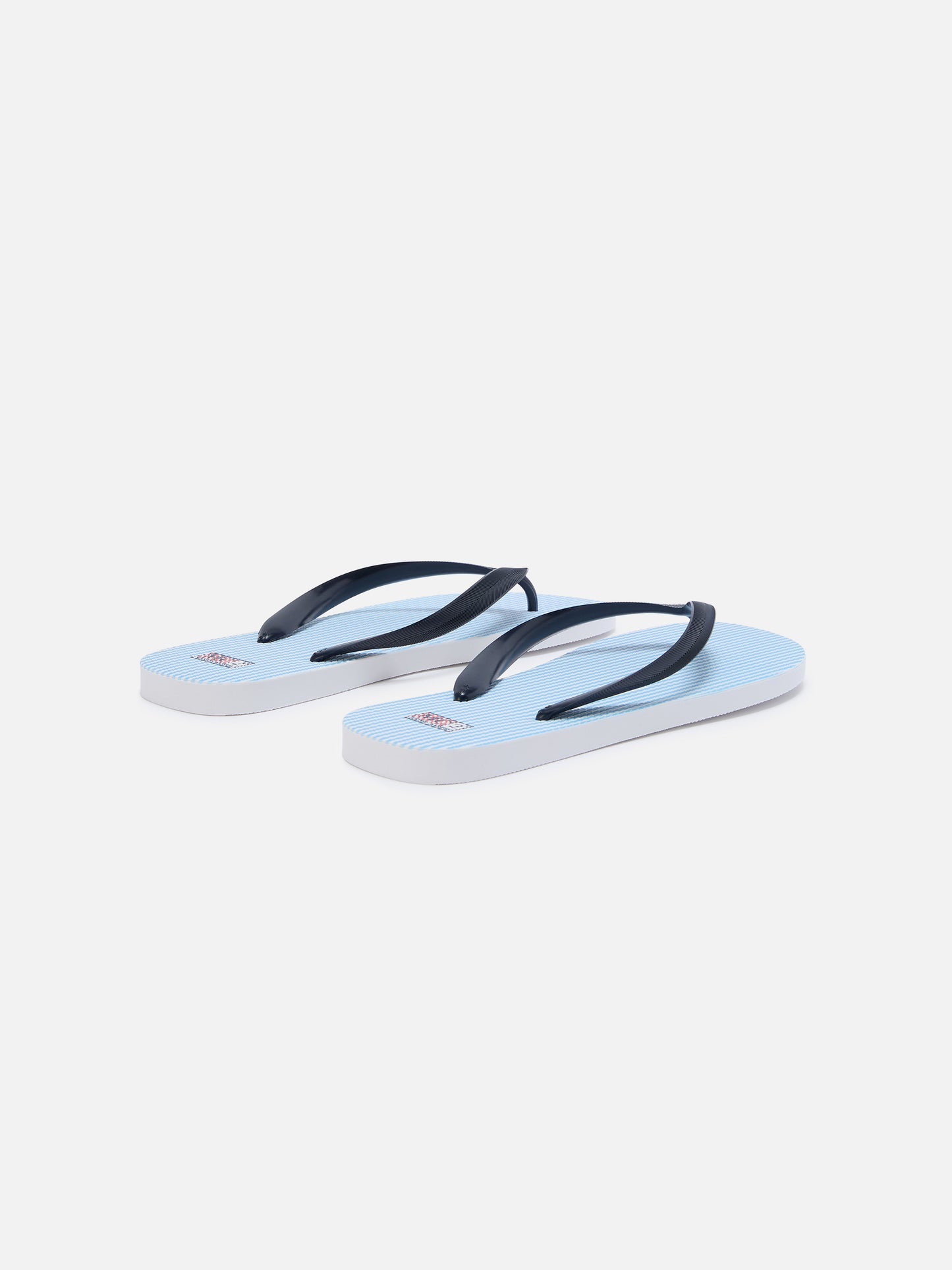Tommy rubber slip-on flip flops with light blue stripes