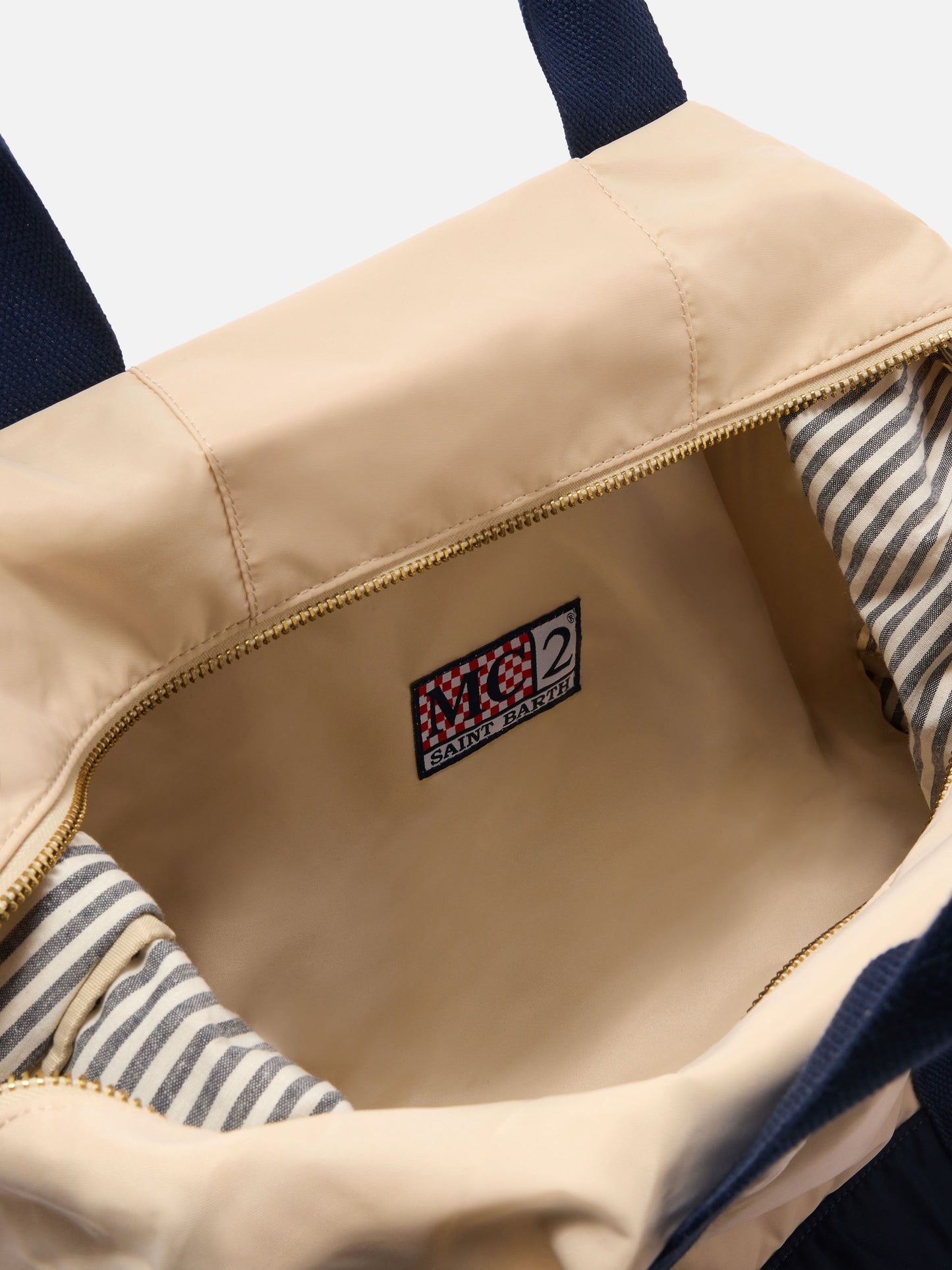 Borsone Travel Bag in nylon panna e blu con logo ricamato