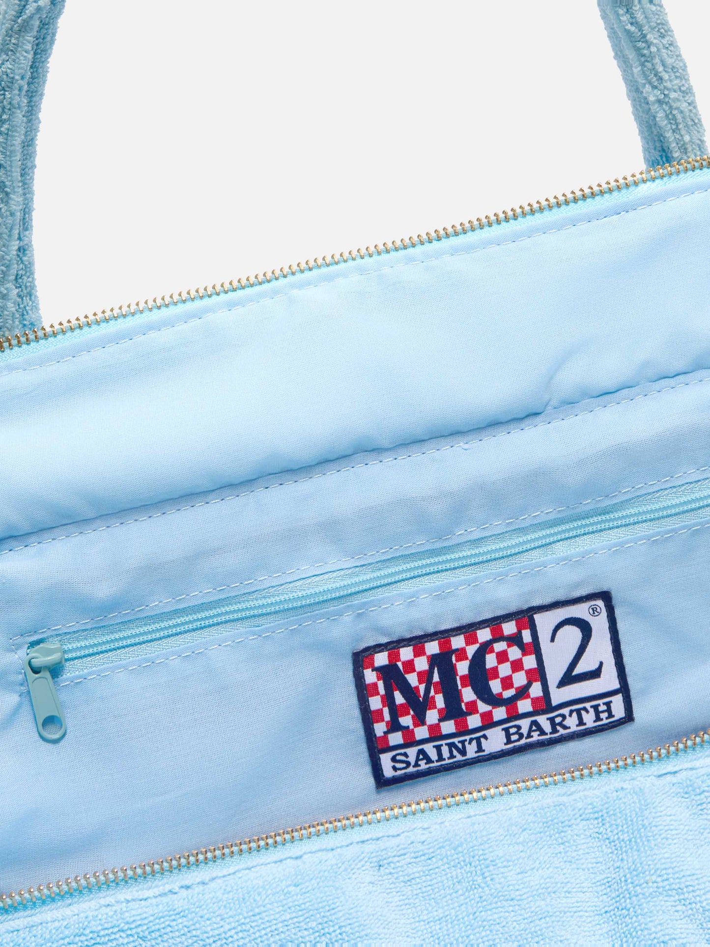 Borsa Vanity regular in tessuto effetto spugna azzurro tinta unita