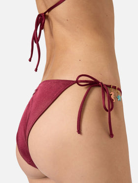 Leah Virgo red glossy finish bikini with charms