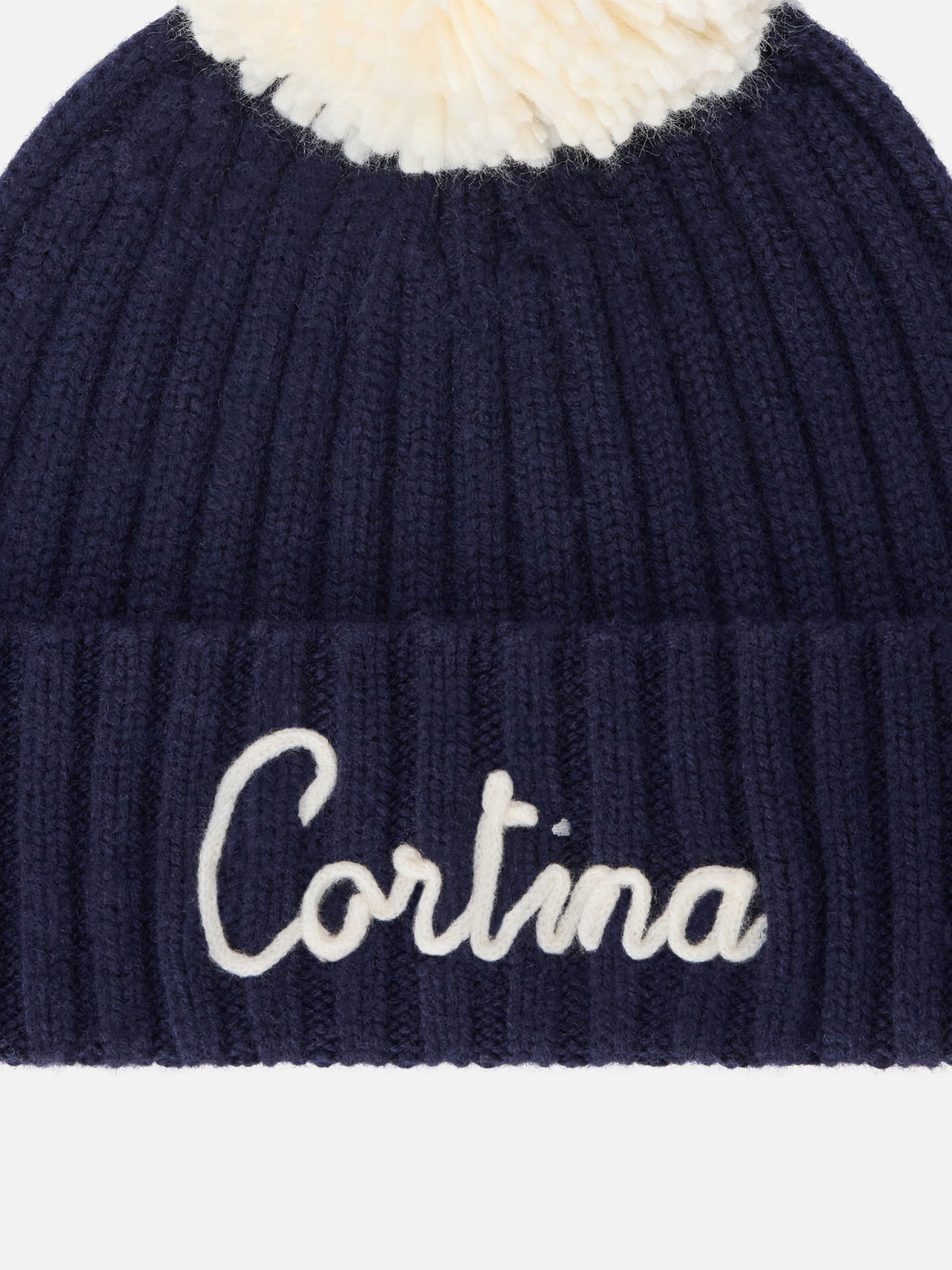 Berretto Wengen blu navy con pompon e ricamo Cortina