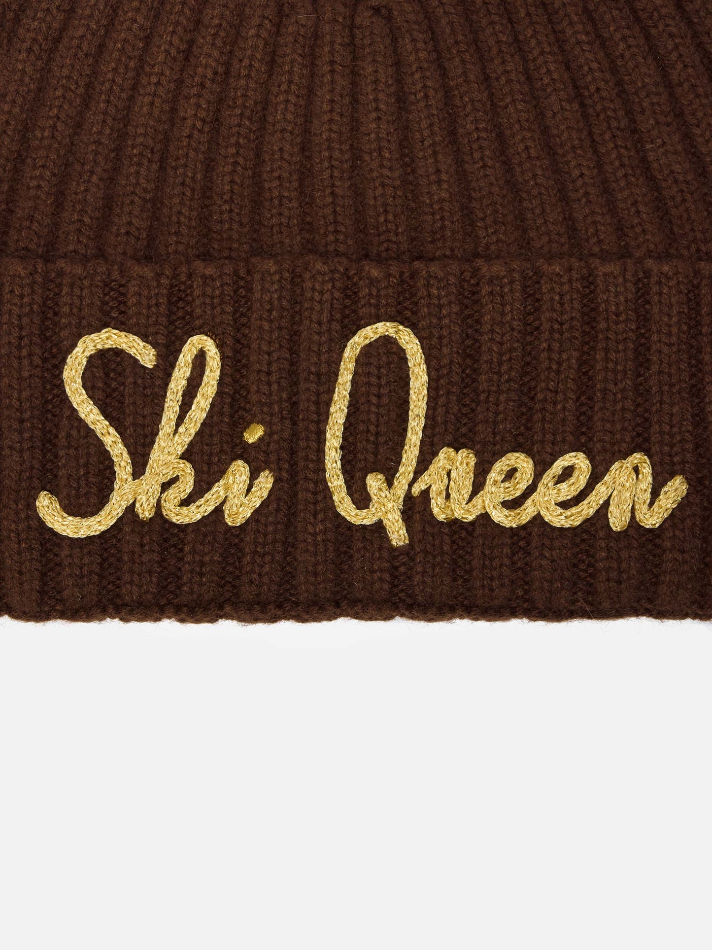 Wengen-Mütze aus Kaschmirmischung in Braun mit Lurex-Stickerei „Ski Queen“.