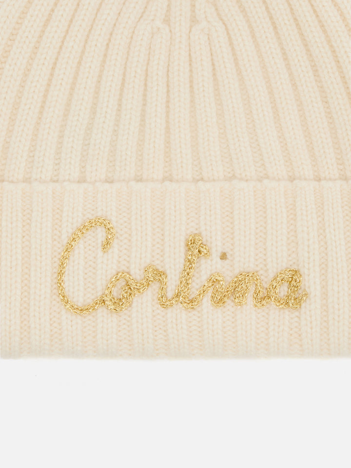 Berretto Wengen in misto cashmere bianco con ricamo lurex Cortina e pompon