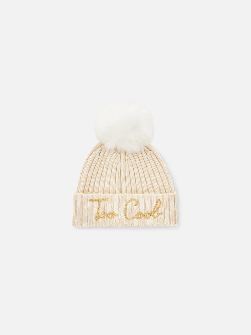 Woman white beanie with Too Cool embroidery and pompon