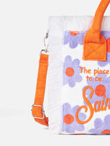 Colette-Handtasche aus Frottee mit violettem und orangefarbenem Gänseblümchen-Print