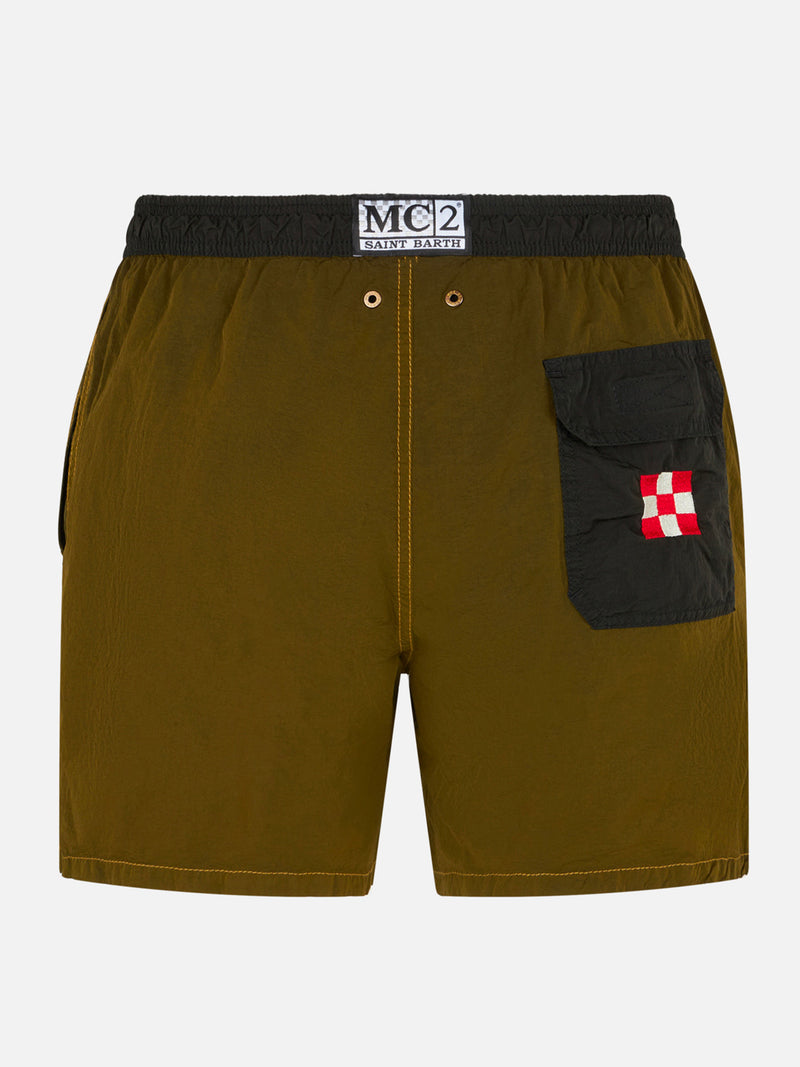 Man ochre light fabric swim shorts