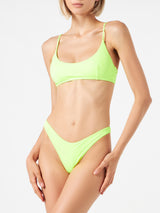 Woman fluo yellow bralette bikini