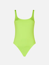 Woman lime one piece swimsuit