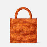 Orangefarbene Mini-Vanity-Basttasche mit Stickerei vorne