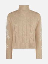 Woman turtleneck braided sweater with snowflake rhinestones