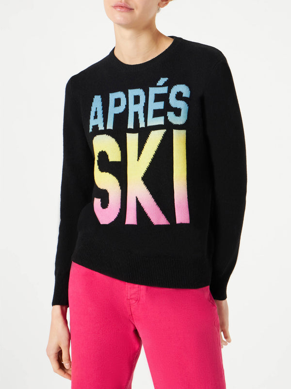 Woman black sweater Aprés Ski degrade writing