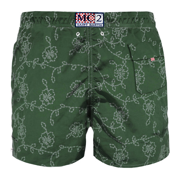 Green embroidered swim shorts
