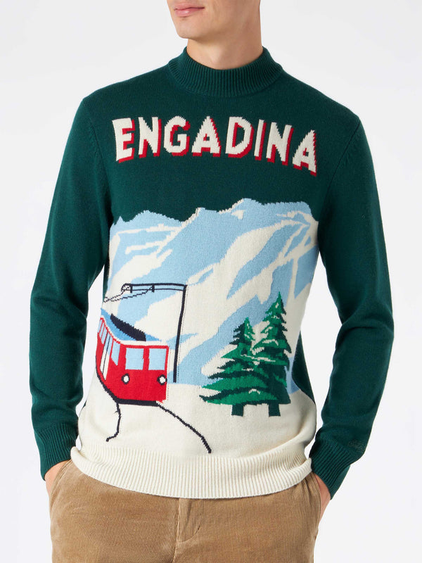 Man green sweater with knitted postcard