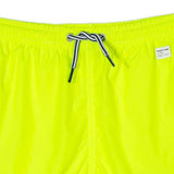 Boy fluo yellow swim shorts | PANTONE™ SPECIAL EDITION